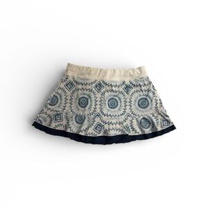 Sofibella tennis or pickleball Elegant Cream and Blue Geometric Mini Skort